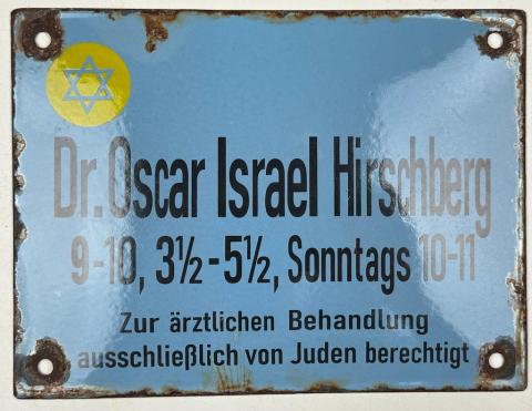 Holocaust Jew Jewish doctor in Ghetto wall sign with yellow STAR OF DAVID
