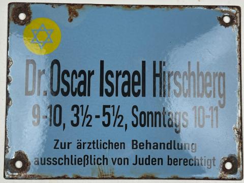 Holocaust Jew Jewish doctor in Ghetto wall sign with yellow STAR OF DAVID Holocaust Jew Jewish doctor in Ghetto wall sign with yellow STAR OF DAVID