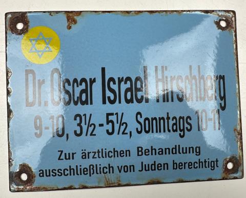 Holocaust Jew Jewish doctor in Ghetto wall sign with yellow STAR OF DAVID Holocaust Jew Jewish doctor in Ghetto wall sign with yellow STAR OF DAVID