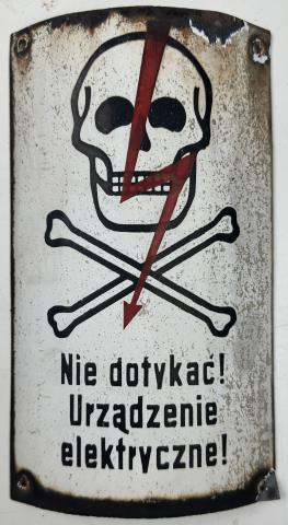 Concentration camp AUSCHWITZ BIRKENAU fences achtung minen skull metal sign