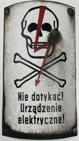 Concentration camp AUSCHWITZ BIRKENAU fences achtung minen skull metal sign Concentration camp AUSCHWITZ BIRKENAU fences achtung minen skull metal sign