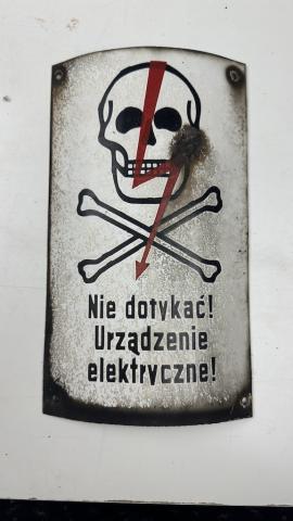 Concentration camp AUSCHWITZ BIRKENAU fences achtung minen skull metal sign