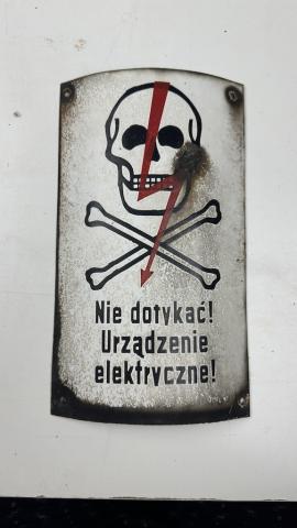 Concentration camp AUSCHWITZ BIRKENAU fences achtung minen skull metal sign