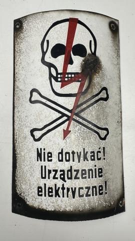 Concentration camp AUSCHWITZ BIRKENAU fences achtung minen skull metal sign
