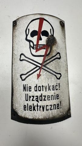 Concentration camp AUSCHWITZ BIRKENAU fences achtung minen skull metal sign
