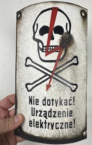 Concentration camp AUSCHWITZ BIRKENAU fences achtung minen skull metal sign