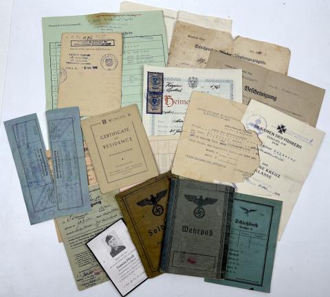 GROUPING Documents and ID from one soldier Panzer division Soldbuch Wehrpass iron cross award etcGROUPING Documents and ID from one soldier Panzer division Soldbuch Wehrpass iron cross award etc