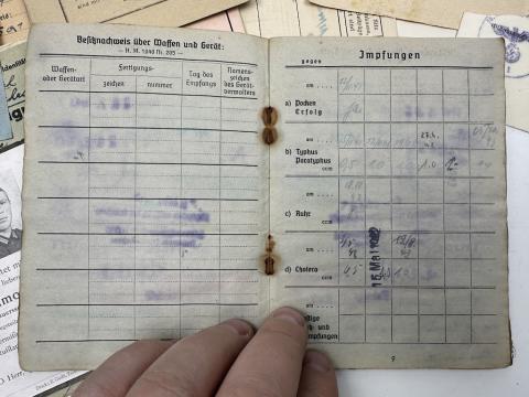 GROUPING Documents and ID from one soldier Panzer division Soldbuch Wehrpass iron cross award etc