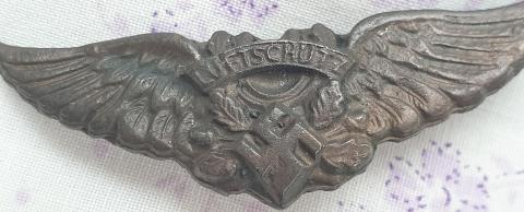 Third reich early LUFSTCHUTZ breast badge metal with Swastika