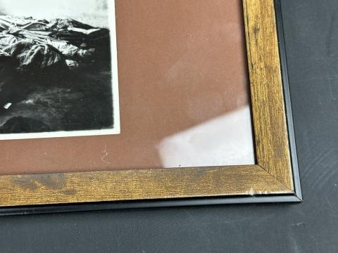 Zyklon B canister label in frame with holocaust photo Concentration Camp