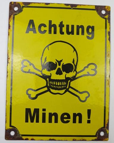 Concentration camp fences achtung minen skull metal sign