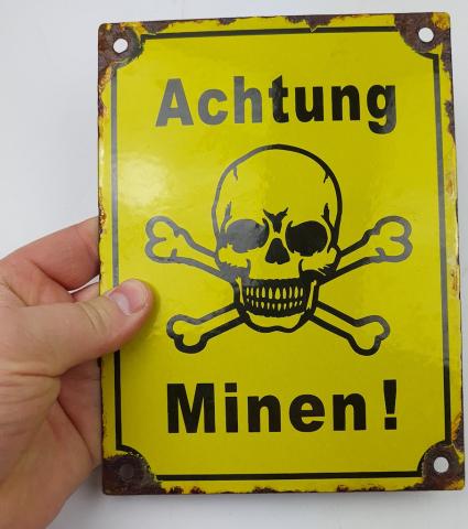 Concentration camp fences achtung minen skull metal sign