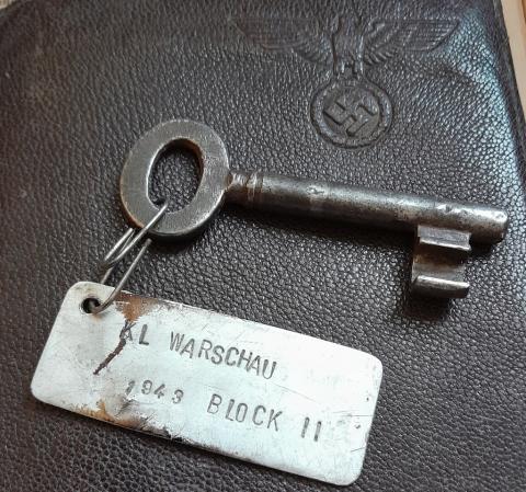 prison or concentration camp key with metal plate WARSAprison or concentration camp key with metal plate WARSAW 1943 block II forced labour 1943 block II forced labour