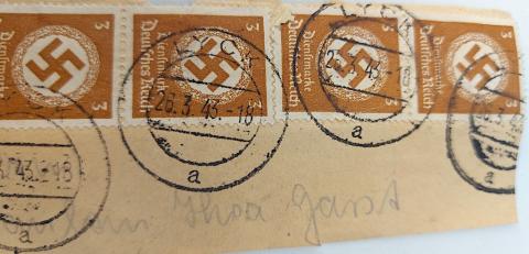 WW2 German Nazi Third Reich Swastika stamps (4) on a piece of feldpost enveloppe