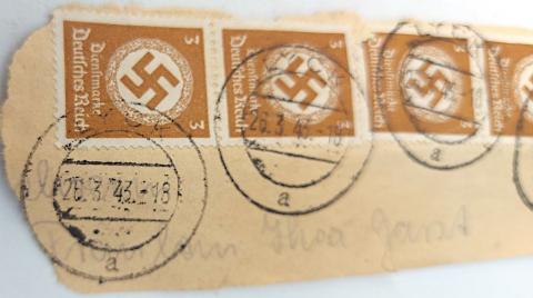 WW2 German Nazi Third Reich Swastika stamps (4) on a piece of feldpost enveloppe