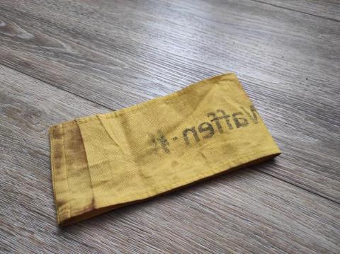 WW2 German Nazi Waffen SS yellow armband stamped with red SS stamp