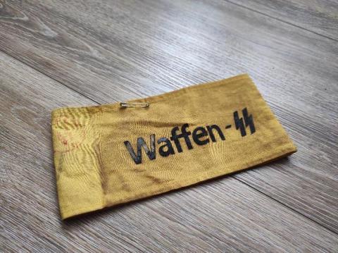 WW2 German Nazi Waffen SS yellow armband stamped with red SS stamp
