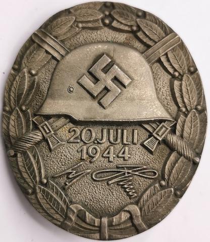 RARE wound badge award dated , marked & signed Himmler & Hitler for the attemps of assassination of the Fuhrer