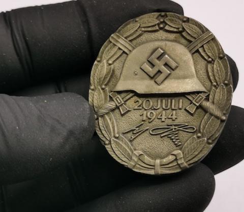 RARE wound badge award dated , marked & signed Himmler & Hitler for the attemps of assassination of the Fuhrer