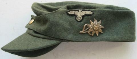 AMAZING WW2 GERMAN NAZI WAFFEN SS TOTENKOPF M43 MOUNTAIN CAP SHOOTER ALPINE WITH EXTRAS INSIGNIAS