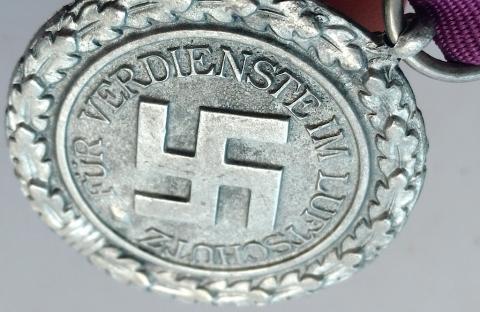 WW2 GERMAN NAZI FUR VERDIENSTE IM LUFTSCHULTZ MEDAL WITH RIBBON