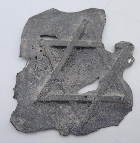 Star of David plate part recovered in Ghetto Krakow near Auschwitz
