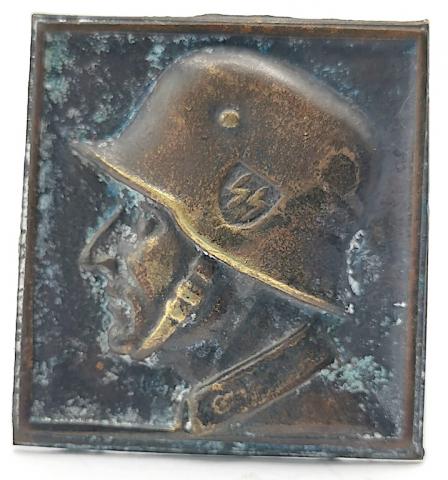 WW2 GERMAN NAZI WAFFEN SS SOLDIER'S HEAD WITH HELMET PIN RELICWW2 GERMAN NAZI WAFFEN SS SOLDIER'S HEAD WITH HELMET PIN RELIC