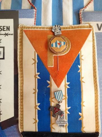 Concentration camp Dachau & Mauthausen inmate survivor grouping of pennants, medals, pins, flags