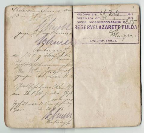 ww1 German soldier Id soldbuch with many entries and stamps