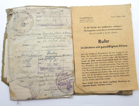 WW2 German Nazi salty Wehrmacht Soldbuch ID with many entries, stamps  & photo