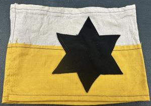 authentic original Holocaust JEWISH GHETTO POLICE JUDENRAT ARMBAND with a black Star of David jew getto polizei