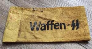 WW2 German Nazi Waffen SS yellow armband stamped with red SS stamp