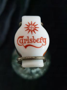 RARE PRE THIRD REICH 1920S DANISH BREWERY CARLSBERG BEER BOTTLE WITH THE USE OF THE "CHANCE" SWASTIKA ON THE LOGO AND ON THE BOTTLE