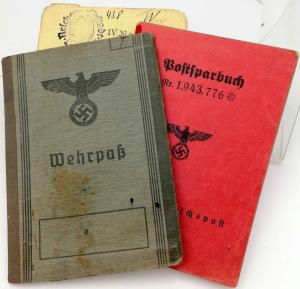 WW2 German Nazi set of 3 ID from a wehrmacht soldier including a wehrpass with many entries, photo and stamps